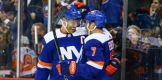 Jordan Eberle and Anders Lee of the New York Islanders celebrate a goal