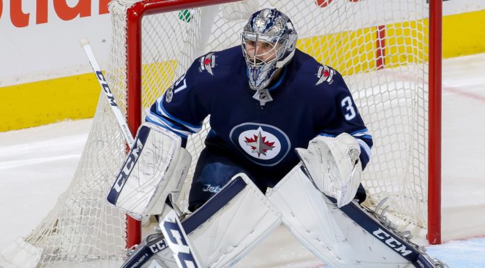 Connor Hellebuyck trade rumors, Winnipeg Jets goalie in net as Elliotte Friedman says a deal has to happen