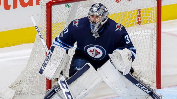 Connor Hellebuyck Connor Hellebuyck trade rumors, Winnipeg Jets goalie in net as Elliotte Friedman says a deal has to happen
