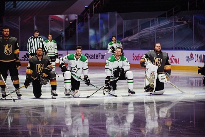 Tyler Seguin, Jason Dickinson, Ryan Reaves and Robin Lehner all take a knee during the National Anthems Tyler Seguin, Jason Dickinson, Ryan Reaves and Robin Lehner all take a knee during the National Anthems