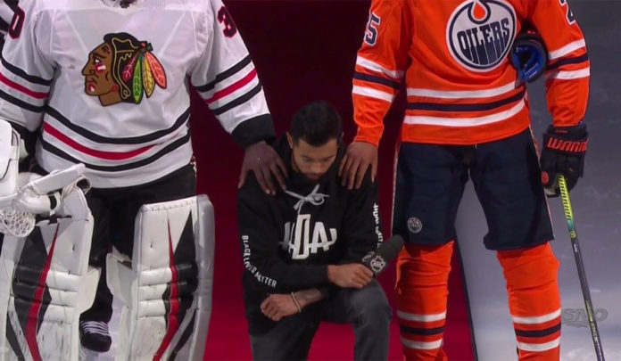 Matt-Dumba-kneels-during-American-National-Anthem Minnesota Wild defenseman takes a knee during the American National Anthem
