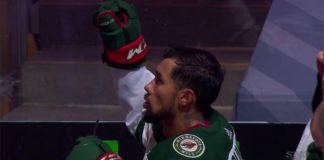 Matt Dumba raises fist during National Anthems before playoff qualifying round game Matt Dumba raises fist during National Anthems