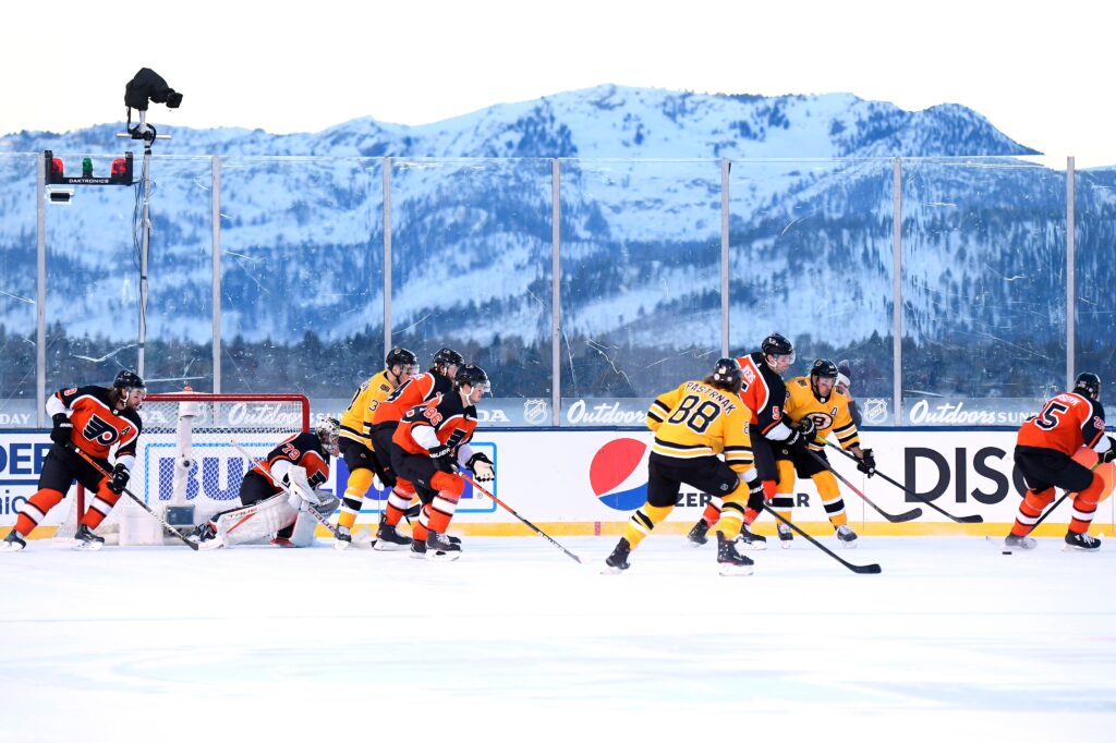 Flyers and Bruins in front of mountains Lake Tahoe