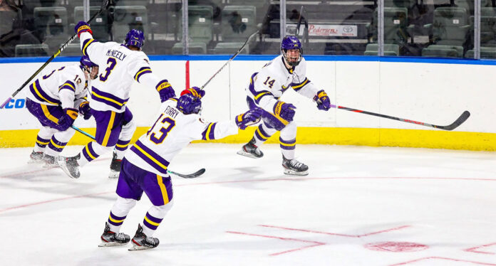 Minnesota-State-Hockey The Minnesota State Mavericks hockey team celebrates a goal