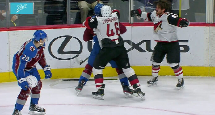 Nathan-MacKinnon-helmet Nathan MacKinnon throws helmet at Conor Garland