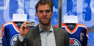 Connor McDavid hits 100 point-mark again Connor Mcdavid poses with his 100th NHL point game puck