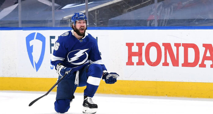 Nikita-Kucherov-NHL-22-cover Tampa Bay Lightning forward Nikita Kucherov celebrates a goal