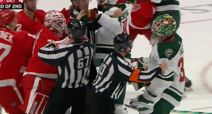 Cam-Talbot-skates-down-ice Minnesota goalie Cam Talbot skates down ice to join brawl with Red Wings goalie Alex Nedeljkovic