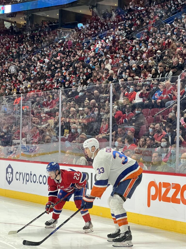 Zdeno Chara and Cole Caufield line up on faceoff