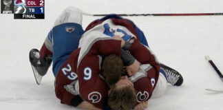 Nathan MacKinnon and Erik Johnson share emotional embrace after winning Stanley Cup Nathan MacKinnon and Erik Johnson hug after winning Stanley Cup
