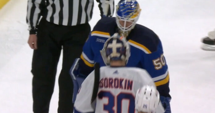 Jordan-Binnington-bumps-Ilya-Sorokin St. Louis Blues goalie Jordan Binnington bumps into New York Islanders goalie Ilya Sorokin
