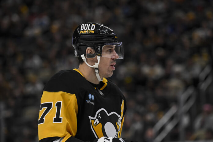 NHL: NOV 16 Sharks at Penguins Pittsburgh Penguins center Evgeni Malkin looks on during a Penguins game