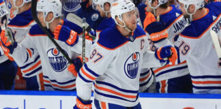 Connor McDavid sets insane career milestone, on verge of NHL history Connor McDavid celebrates goal with teammates