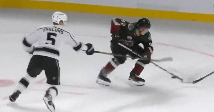 Logan-Cooley-goal-Global-Series Arizona Coyotes' rookie Logan Cooley scores a sensational goal in the NHL preseason, showcasing his talent and potential during the 2023 NHL Global Series
