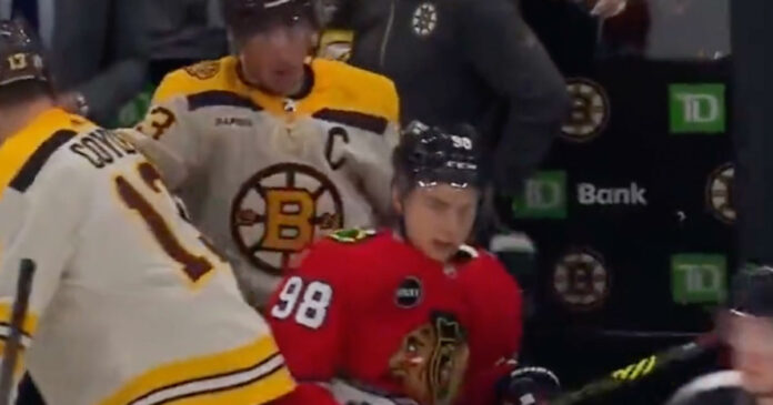 Marchand-Bedard2 Brad Marchand welcomes Connor Bedard into the NHL with his antics