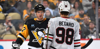 Epic photo captures Connor Bedard and Sidney Crosby faceoff Sidney Crosby and Connor Bedard faceoff