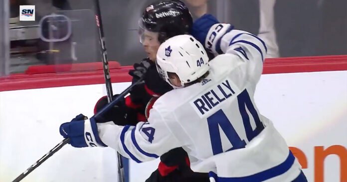 Morgan-Rielly Morgan Rielly hit on Ridly Greig