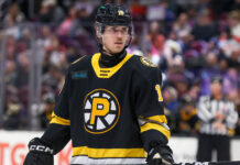 NHL Neck Guard Rule: Every Rookie Must Wear One in 2026-27 Providence Bruins left wing Georgii Merkulov wearing neck guard