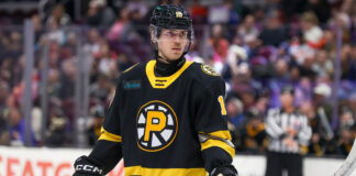 AHL Mandates Neck Guards for 2024-25 Season; NHL to Follow? Providence Bruins left wing Georgii Merkulov wearing neck guard