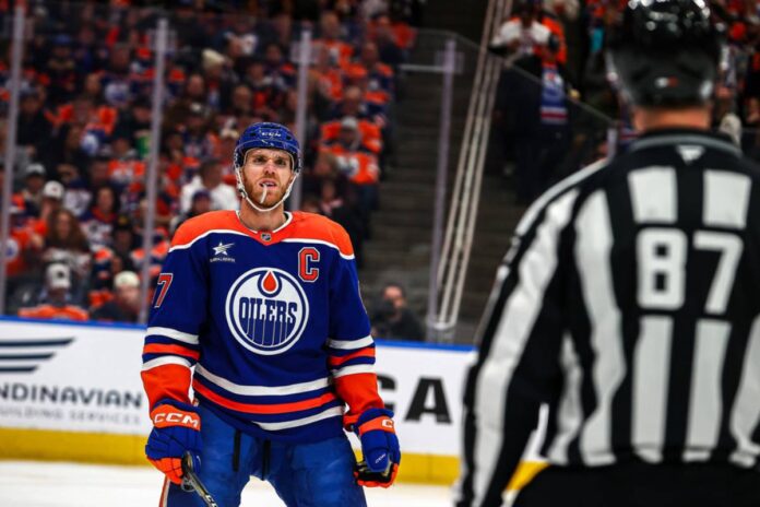 Edmonton Oilers Center Connor McDavid (97) is frustrated with a non call from an official in the second period of the Edmonton Oilers game versus the Los Angeles Kings on January 13, 2025 at Rogers Place in Edmonton, AB. (Photo by Curtis Comeau/Icon Sportswire) Connor McDavid Edmonton Oilers ankle injury game-time decision Ducks playoffs