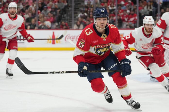 Florida Panthers center Sam Reinhart (13) races to the loose puck during the game between the Detroit Red Wings and the Florida Panthers on Thursday, January 16, 2025 at Amerant Bank Arena in Sunrise, Fla Panthers' Sam Reinhart Ejected vs Ducks For Dirty Hit
