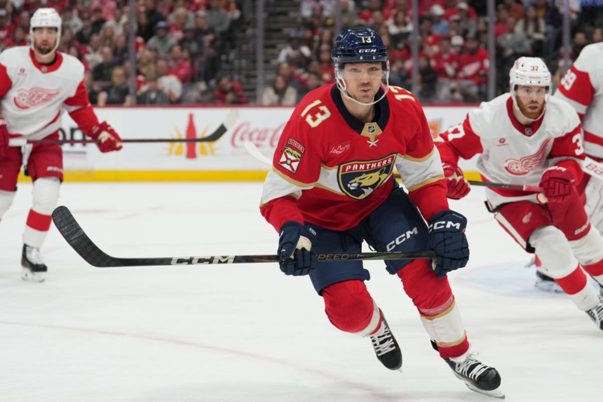Florida Panthers forward Sam Reinhart skates up ice in his number 13 jersey against the Detroit Red Wings