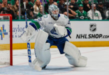 Vancouver Canucks goaltender Thatcher Demko (35) looks for the puck during the game between the Dallas Stars and the Vancouver Canucks on January 31, 2025 at American Airlines Center in. Dallas, Texa
