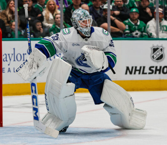 Vancouver Canucks goaltender Thatcher Demko (35) looks for the puck during the game between the Dallas Stars and the Vancouver Canucks on January 31, 2025 at American Airlines Center in. Dallas, Texa