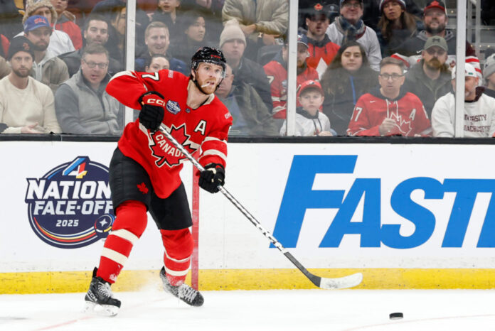 Team Canada forward Connor McDavid (97) fires a pass during a 4 Nations Face-Off game between Team Canada and Team Finland on February 17, 2025, at TD Garden in Boston, Massachusetts. Connor McDavid Sinks USA With Epic OT Winner in 4 Nations Final
