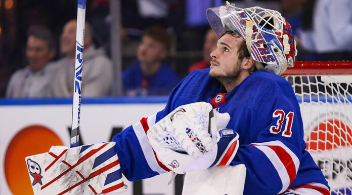 Igor Shesterkin Injury: Rangers Goalie Helped Off Ice Rangers goalie Igor Shesterkin looks up during a game