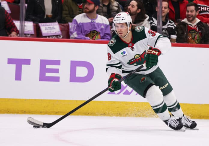 Ryan Hartman #38 of the Minnesota Wild controls the puck during the first period against the Chicago Blackhawks on January 26, 2025 at the United Center in Chicago, Illinois. Ryan Hartman Gets Hefty 10-Game Suspension For Roughing Tim Stutzle