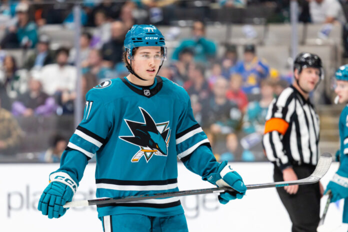 SAN JOSE, CA - MARCH 22: San Jose Sharks center Macklin Celebrini (71) looks on during a NHL game against the San Jose Sharks on March 22, 2025 at SAP Center at San Jose in San Jose, CA. (Photo by Matthew Huang/Icon Sportswire) Macklin Celebrini San Jose Sharks captain Canada IIHF World Championship Crosby
