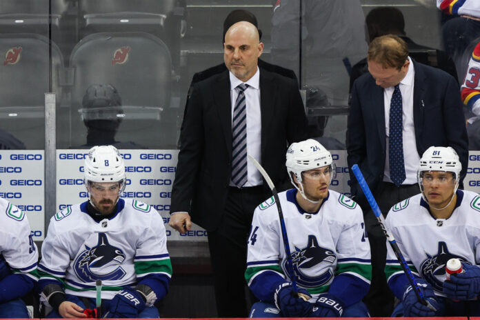 NHL: JAN 06 Canucks at Devils NEWARK, NJ - JANUARY 06: Vancouver Canucks head coach Rick Tocchet looks on during a game between the Vancouver Canucks and New Jersey Devils on January 6, 2024 at Prudential Center in the Newark, New Jersey.