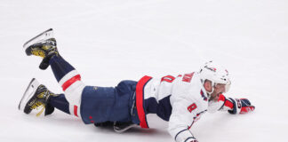 Alex Ovechkin Scores 895th Career Goal to Break Wayne Gretzky’s All-Time NHL Record ELMONT, NY - APRIL 06: Washington Capitals left wing Alex Ovechkin (8) celebrates after scoring his 895th career goal breaking the NHL record for most goals ever in a NHL game between the Washington Capitals and New York Islanders at UBS Arena on April 6, 2025 in Elmont, New York.