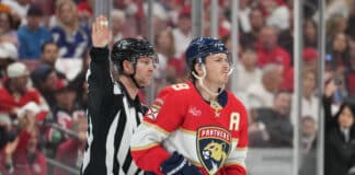 Matthew Tkachuk Receives Five-Minute Major For Late Hit On Jake Guentzel SUNRISE, FL - APRIL 26: Florida Panthers left wing Matthew Tkachuk (19) is escorted to the team bench in the first period during the Stanley Cup Playoffs First Round game between the Tampa Bay Lightning and the Florida Panthers on Saturday, April 26, 2025 at Amerant Bank Arena in Sunrise, FL.