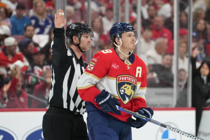 NHL: APR 26 Stanley Cup Playoffs First Round Lightning at Panthers SUNRISE, FL - APRIL 26: Florida Panthers left wing Matthew Tkachuk (19) is escorted to the team bench in the first period during the Stanley Cup Playoffs First Round game between the Tampa Bay Lightning and the Florida Panthers on Saturday, April 26, 2025 at Amerant Bank Arena in Sunrise, FL.