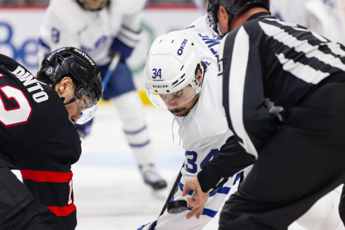 NHL: JAN 25 Maple Leafs at Senators Toronto Maple Leafs captain Auston Matthews takes a faceoff, back injury questions after knee surgery