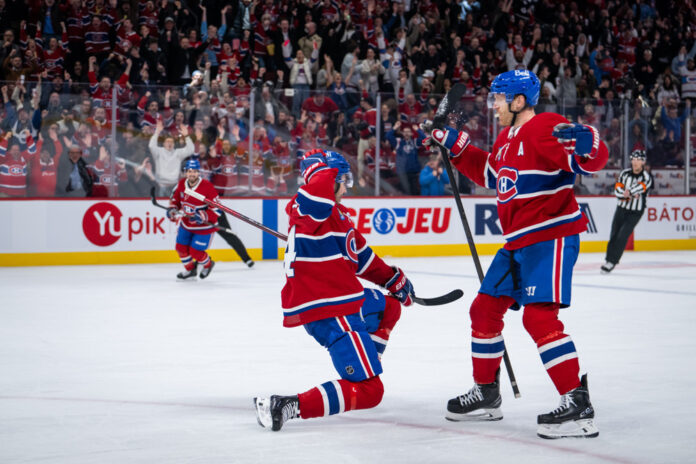 NHL: APR 16 Hurricanes at Canadiens Montreal Canadiens Nick Suzuki celebrates a goal