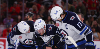 Jets Dealt Concerning Injury Update With Playoffs Around The Corner Mason Appleton #22 of the Winnipeg Jets helps Nikolaj Ehlers #27 of the Winnipeg Jets to the bench during the second period against the Chicago Blackhawks on April 12. 2025 at the United Center in Chicago, Illinois.