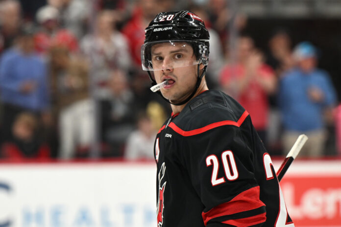 NHL: MAR 28 Canadiens at Hurricanes RALEIGH, NC - MARCH 28: Carolina Hurricanes center Sebastian Aho (20) looks down the bench after scoring a goal during the NHL game between the Montreal Canadiens and the Carolina Hurricanes on March 28, 2025 at Lenovo Center in Raleigh, North Carolina.
