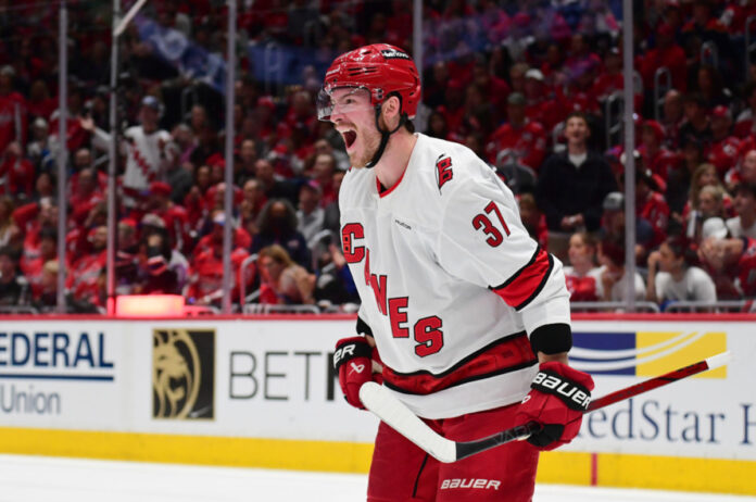 96625050150921_car_v_wshc(1) Andrei Svechnikov Carolina Hurricanes celebrates a goal in his white road sweater