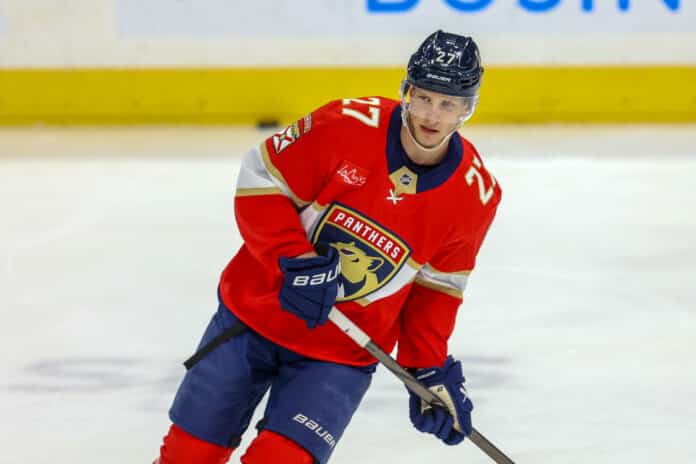 NHL: MAR 08 Sabres at Panthers SUNRISE, FL - MARCH 08: Florida Panthers Center Eetu Luostarinen (27) looks on during the pre game warmup at the NHL game between the Buffalo Sabres and the Florida Panthers on Saturday March 8, 2025 at Amerant Bank Arena in Sunrise, Fla.