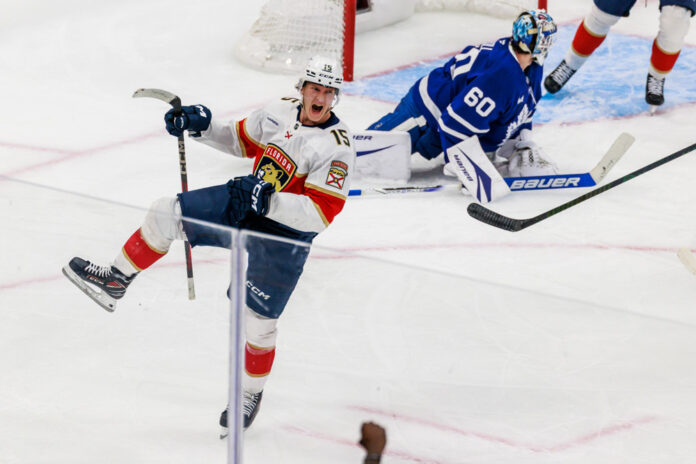 NHL: MAY 18 Stanley Cup Playoffs 2nd Round Panthers at Maple Leafs TORONTO, ON - May 18: Florida Panthers center Anton Lundell (15) celebrates a goal as Toronto Maple Leafs goaltender Joseph Woll (60) looks on during the second period of game 7 of the Eastern Conference Playoffs between the Florida Panthers and Toronto Maple Leafs on May 18, 2025, at Scotiabank Arena in Toronto, ON.