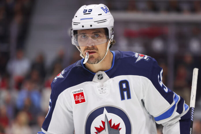 NHL: FEB 26 Jets at Senators OTTAWA, ON - FEBRUARY 26: Winnipeg Jets Center Mark Scheifele (55) after a whistle during second period National Hockey League action between the Winnipeg Jets and Ottawa Senators on February 26, 2025, at Canadian Tire Centre in Ottawa, ON, Canada.