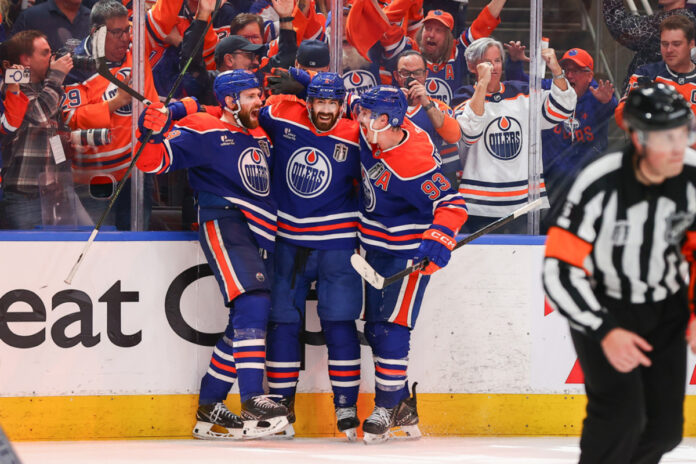 Edmonton Oilers Center Leon Draisaitl (29) celebrates his game winning goal in overtime in game one of Stanley Cup Final Edmonton Oilers game versus the Florida Panthers on June 04, 2025 at Rogers Place in Edmonton, AB. Leon Draisaitl Plays Hero For Oilers With OT Goal in Game 1 vs Panthers