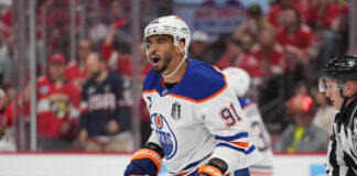 Evander Kane Doesn’t Return For Handshake Line After Late Ejection SUNRISE, FL - JUNE 09: Edmonton Oilers left wing Evander Kane (91) complains after getting a penalty called on him in the first period during game three of the Stanley Cup Finals between the Edmonton Oilers and the Florida Panthers on June 9, 2025 at Amerant Bank Arena, FL.