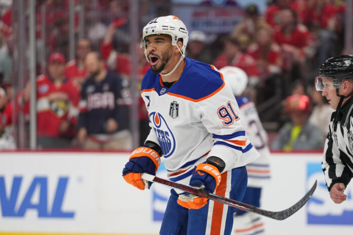 NHL: JUN 09 Stanley Cup Final Oilers at Panthers SUNRISE, FL - JUNE 09: Edmonton Oilers left wing Evander Kane (91) complains after getting a penalty called on him in the first period during game three of the Stanley Cup Finals between the Edmonton Oilers and the Florida Panthers on June 9, 2025 at Amerant Bank Arena, FL.