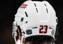 Gaudreau Brothers Anniversary: Two Years Since Aug. 29, 2024 Gaudreau 13 21 helmet decal honoring Johnny Gaudreau and Matthew Gaudreau on Sean Monahan's Blue Jackets helmet