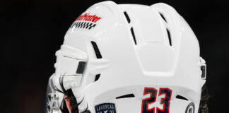Gaudreau Brothers Anniversary: Two Years Since Aug. 29, 2024 Gaudreau 13 21 helmet decal honoring Johnny Gaudreau and Matthew Gaudreau on Sean Monahan's Blue Jackets helmet