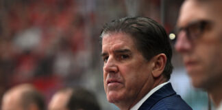 3 Dallas Stars Coaching Candidates to Replace Pete DeBoer RALEIGH, NC - NOVEMBER 27: New York Rangers head coach Peter Laviolette watches the play during the NHL game between the New York Rangers and the Carolina Hurricanes on November 27, 2024 at Lenovo Center in Raleigh, North Carolina.